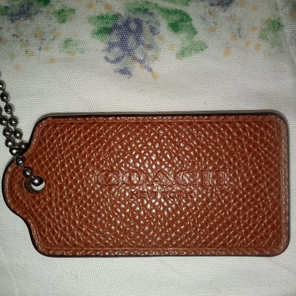 Coach brown hang tag